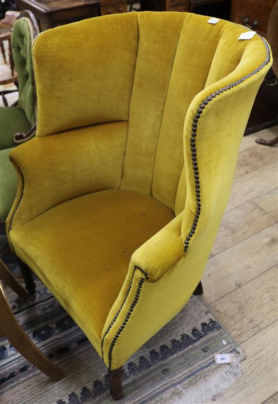 A George III wing armchair